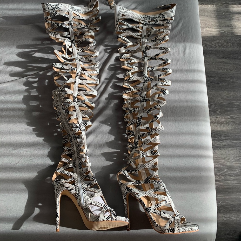 Thigh high snake print strapped sandals